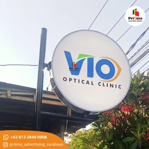 Neonbox Bulat 2 sisi Dengan Tiang Di Surabaya Timur web